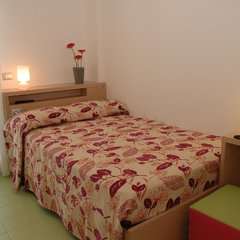 Camera da letto all'Hotel Trieste Mare a Lignano